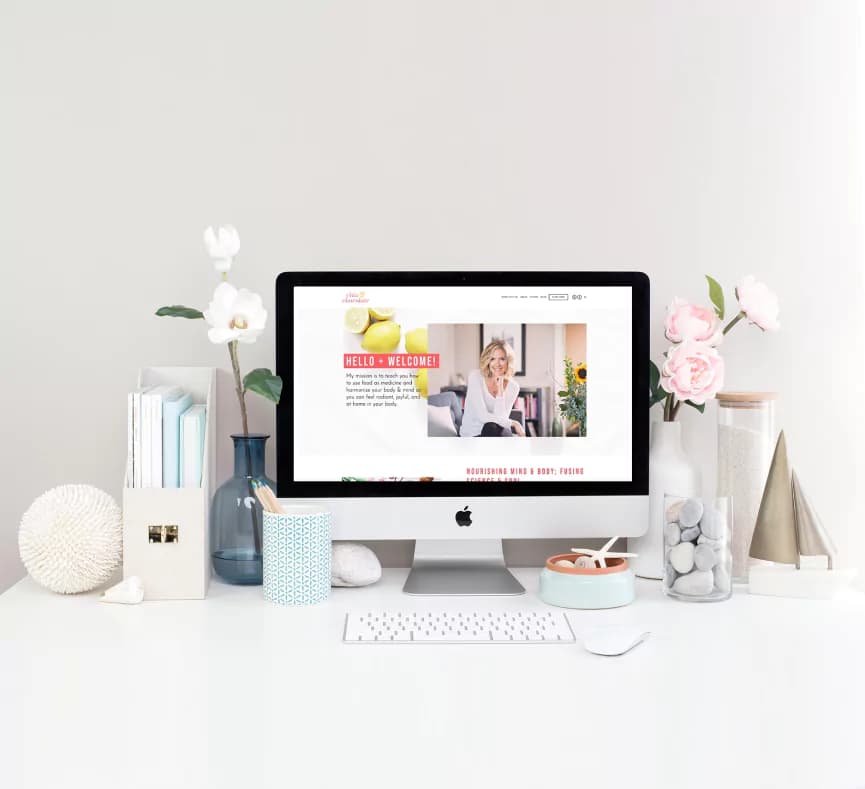 Modern workspace with Squarespace website design on screen